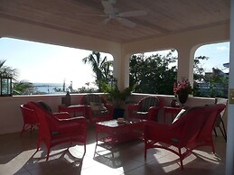 Seaside Sophistication: Elegant Estate With Sunset Views