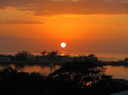 Seaside Sophistication: Elegant Estate With Sunset Views