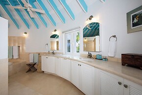 Exquisite Retreat: Contemporary Estate On Pink Sand Beach