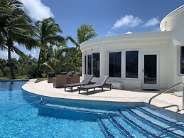 Exquisite Retreat: Contemporary Estate On Pink Sand Beach