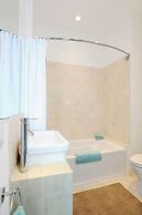 Coastal Haven: Charming Beachfront Cottage With Pool