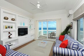 Coastal Haven: Charming Beachfront Cottage With Pool