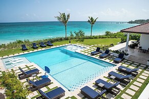 Secluded Serenity: Beachfront Estate On Private Acres