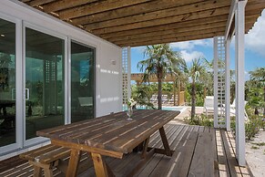 Tropical Haven: Luxurious Home Steps From Beach