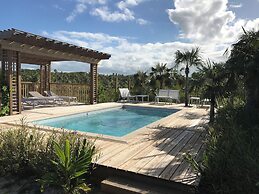 Tropical Haven: Luxurious Home Steps From Beach