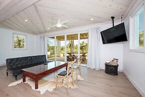 Tropical Haven: Luxurious Home Steps From Beach