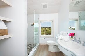 Tropical Haven: Luxurious Home Steps From Beach