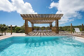 Tropical Haven: Luxurious Home Steps From Beach