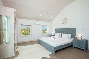 Tropical Haven: Luxurious Home Steps From Beach