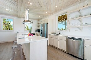 Tropical Haven: Luxurious Home Steps From Beach