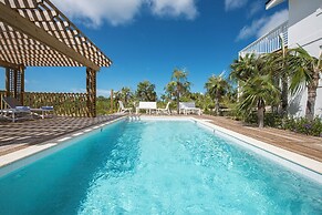 Tropical Haven: Luxurious Home Steps From Beach