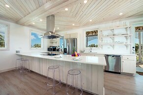 Tropical Haven: Luxurious Home Steps From Beach