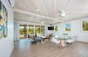 Tropical Haven: Luxurious Home Steps From Beach