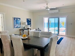 Oceanfront Elegance: New Home With Dock, Kayaks, And Pool
