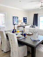 Oceanfront Elegance: New Home With Dock, Kayaks, And Pool