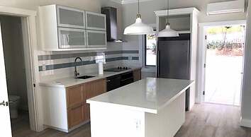 Oceanfront Elegance: New Home With Dock, Kayaks, And Pool