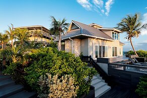 Island Escape: Secluded Beachfront Cottage With Pool