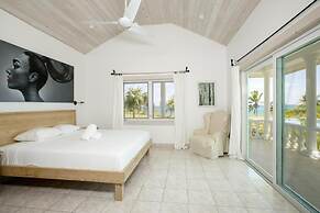 Dream Villa: Private Oasis Above Pink Sand Beach