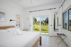 Dream Villa: Private Oasis Above Pink Sand Beach