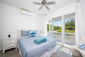 Secluded Luxury: New Beachfront Home With Pool