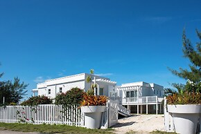 Secluded Luxury: New Beachfront Home With Pool