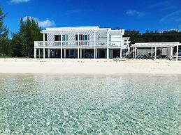 Secluded Luxury: New Beachfront Home With Pool