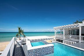 Secluded Luxury: New Beachfront Home With Pool