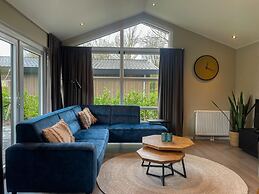 Beautiful Chalet on the Water in a Holiday Park