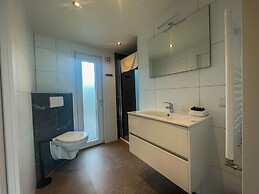 Beautiful Chalet on the Water in a Holiday Park