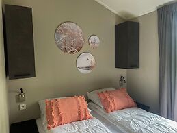 Beautiful Chalet on the Water in a Holiday Park