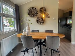 Beautiful Chalet on the Water in a Holiday Park