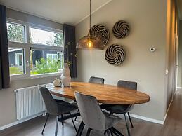 Beautiful Chalet on the Water in a Holiday Park