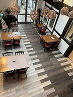 Passage 84 - Hotel & Café