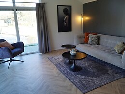 Nice Chalet in a Holiday Park, Adjacent to the Hoge Veluwe National Pa