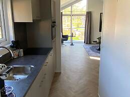 Nice Chalet in a Holiday Park, Adjacent to the Hoge Veluwe National Pa