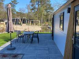 Nice Chalet in a Holiday Park, Adjacent to the Hoge Veluwe National Pa