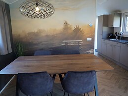 Nice Chalet in a Holiday Park, Adjacent to the Hoge Veluwe National Pa