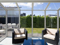 Modern Holiday Home With Sauna, in a Holiday Park, Beach Within Walkin