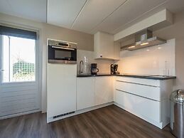 Modern Holiday Home With Sauna, in a Holiday Park, Beach Within Walkin