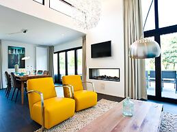 Luxury Holiday Home on a Holiday Park, Adjacent to the Hoge Veluwe Nat