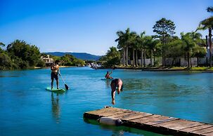 Nomades Riverside - Adventure Hostels & Coworking