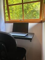Nomades Riverside - Adventure Hostels & Coworking