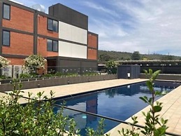 Apartments by the International