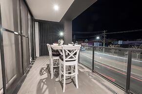 Apartments by the International