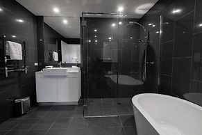 Apartments by the International