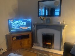 Seasideescape-2br-sleeps4-parking-petsok-fireplace