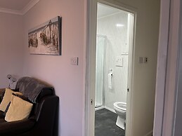 Seasideescape-2br-sleeps4-parking-petsok-fireplace