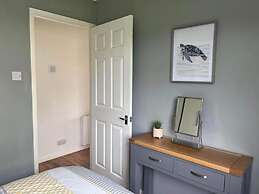 Seasideescape-2br-sleeps4-parking-petsok-fireplace