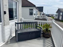 Seasideescape-2br-sleeps4-parking-petsok-fireplace