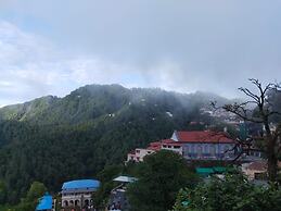 Goroomgo Thee Aura Mussoorie
